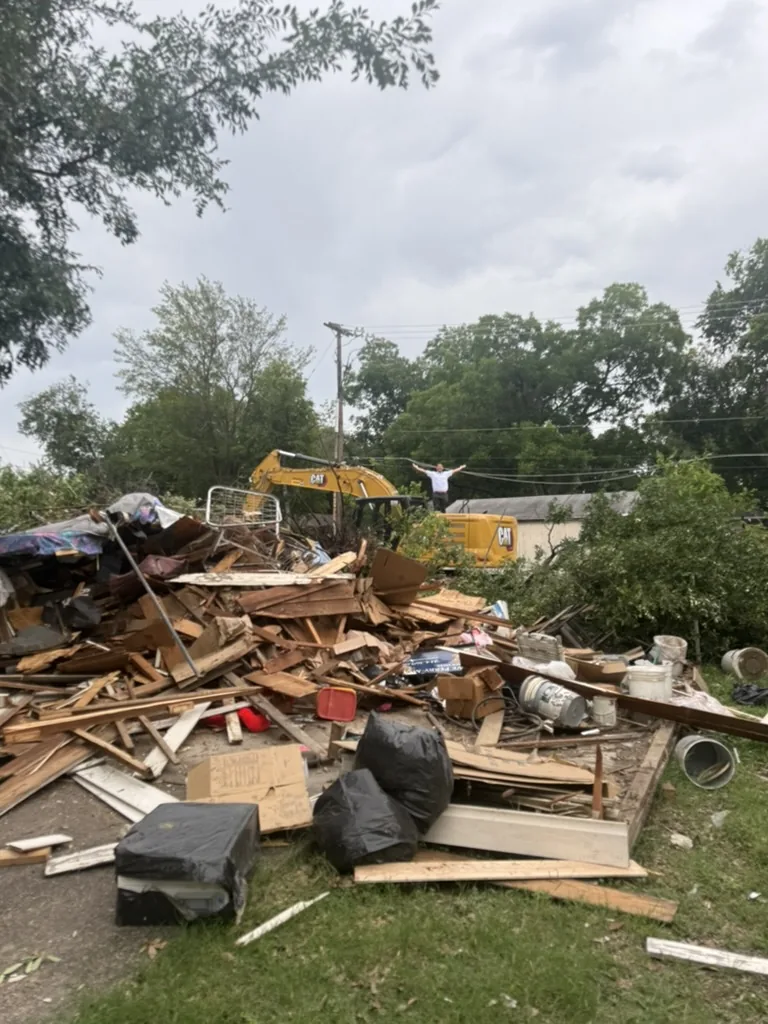 Residential Demolition Dallas: Debris gathered for haul-off Debris gathered for haul-off during a residential demolition in Dallas