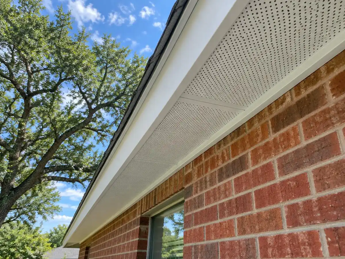 Soffit intake vents under the eave of a home in Farmers Branch, TX