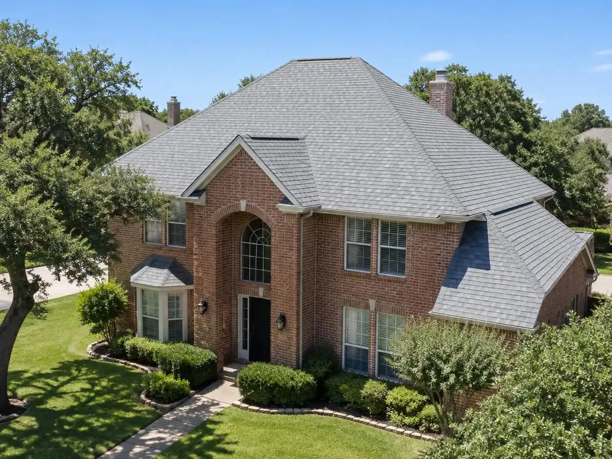 Light-colored cool roof shingles on a home in Farmers Branch, TX