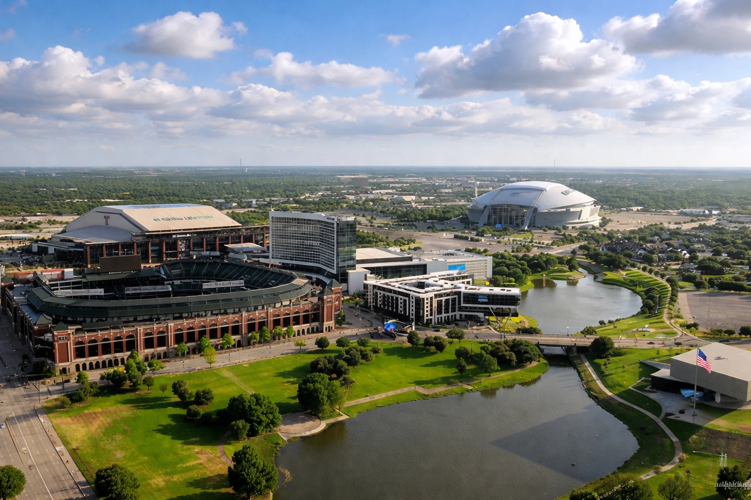 Aerial view of Arlington Texas Entertainment District featuring Globe Life Field and AT&T Stadium with surrounding green spaces and waterways