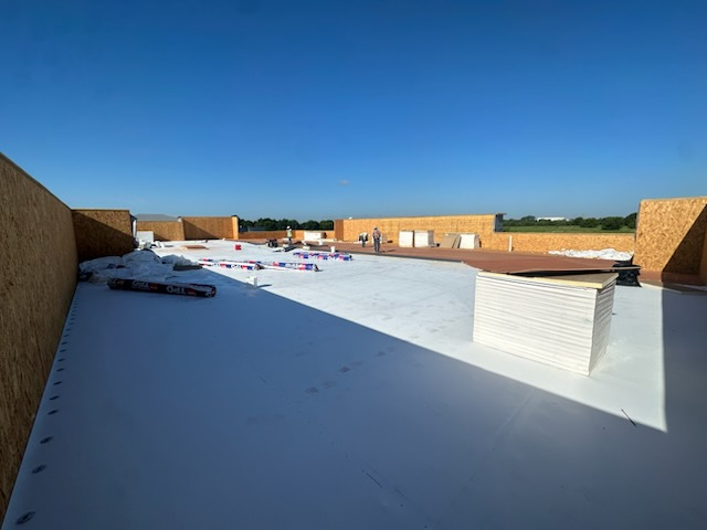 TPO membrane installation on commercial building in Waxahachie, Ellis County, TX