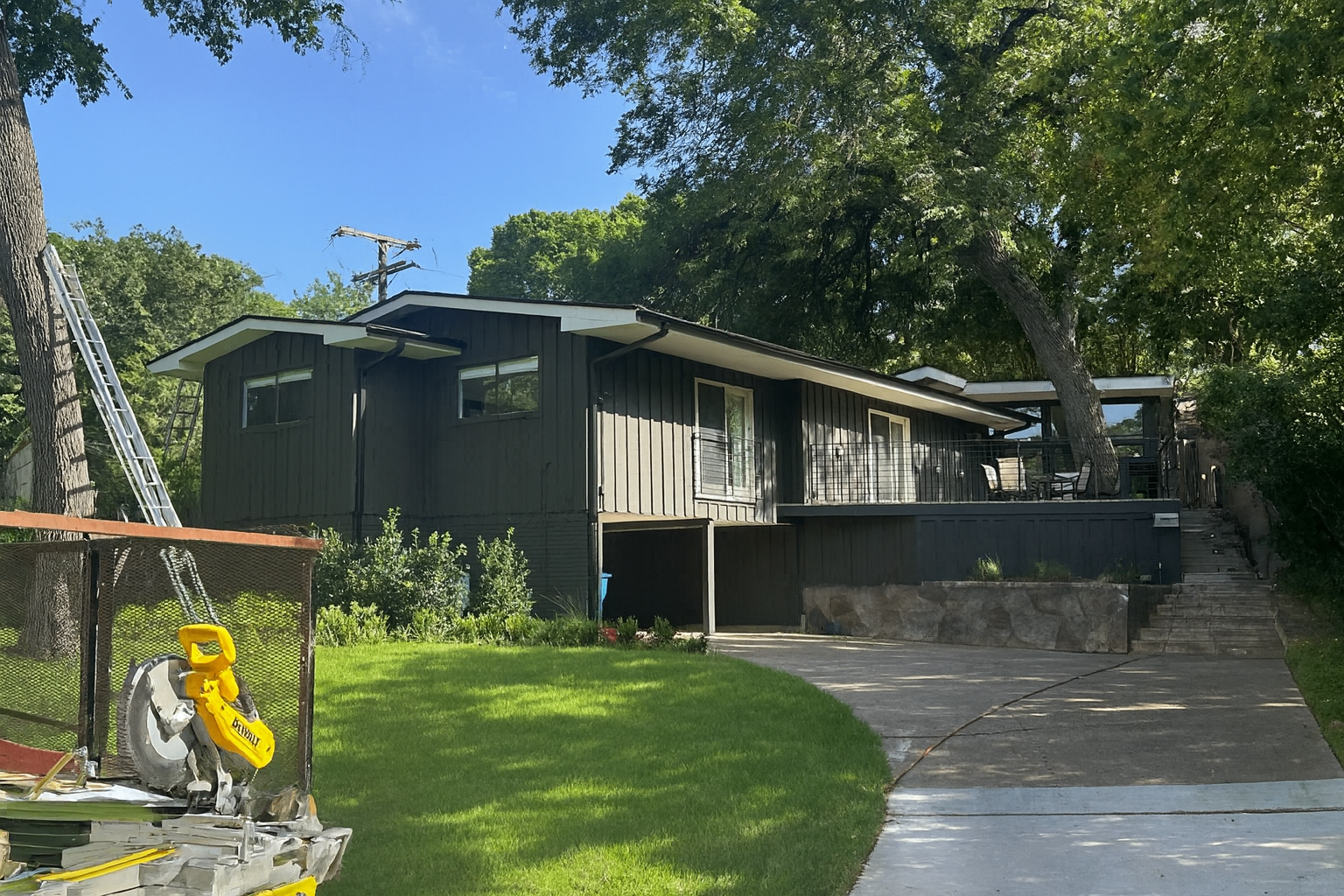 Completed siding installation on a residential home in Lakewood, TX featuring new durable exterior siding