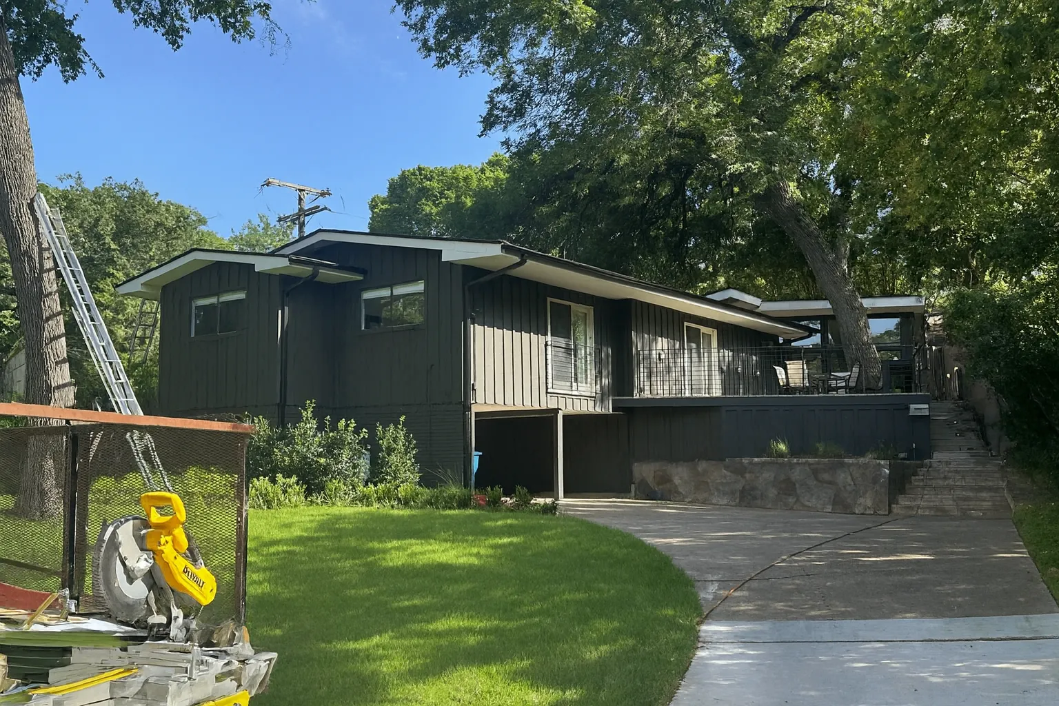 Completed siding installation on a residential home in Lakewood, TX featuring new durable exterior siding