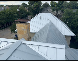 Premium metal roof installation on luxury home in University Park, TX